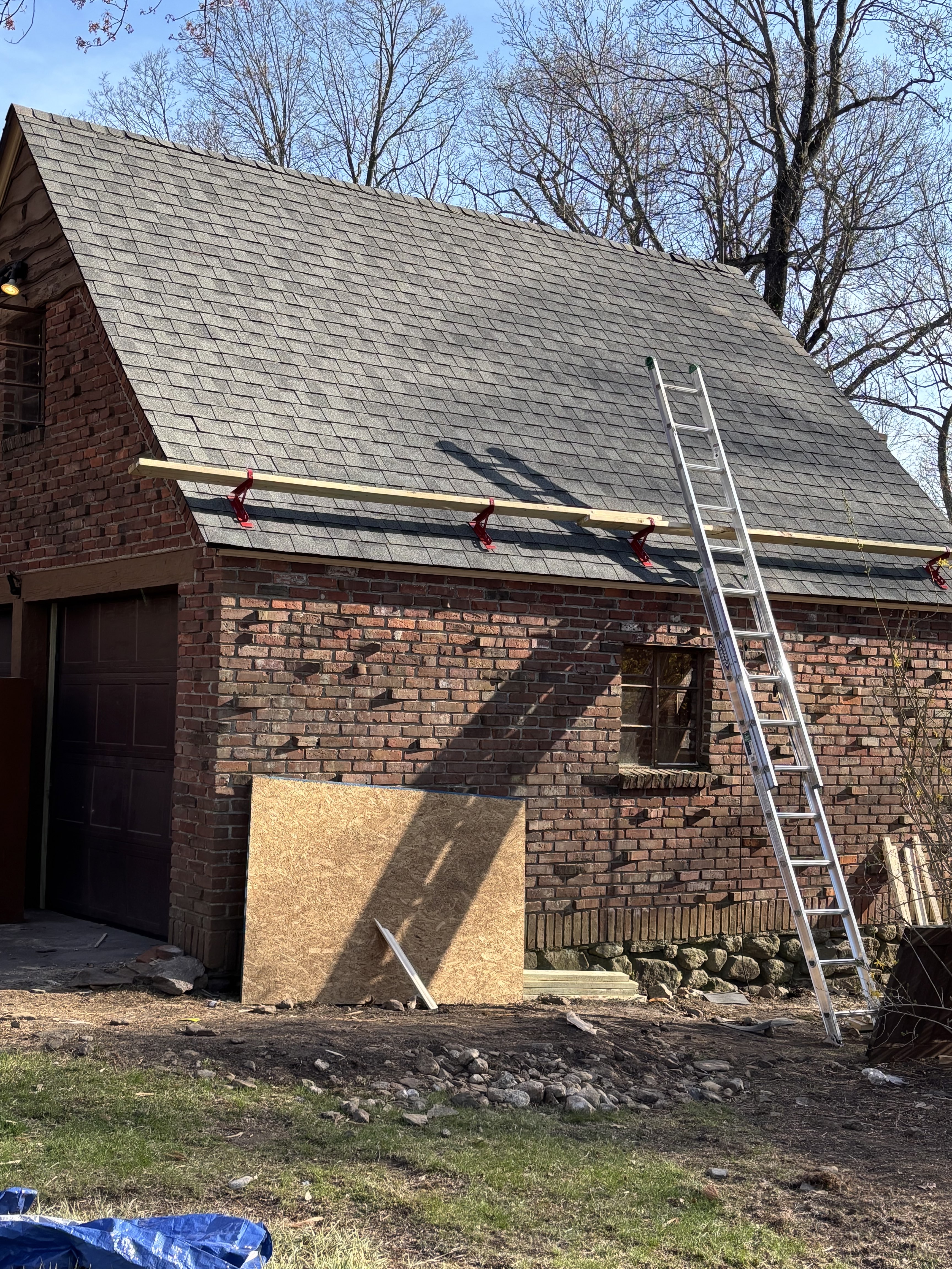 Custom homes & additions exterior during rebuild